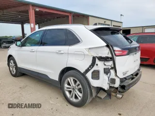 2020 Ford Edge SEL с VIN 2FMPK3J93LBB16928, выставлен на аукционе Copart как лот 63030385 с пробегом 81 567 миль миль и Чистый • Clean title. История ставок и продаж доступна на DreamBid. Изображение 2.