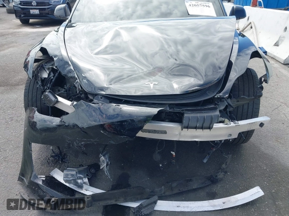 2022 Tesla Model 3 with VIN 5YJ3E1EA7NF314744, listed as a IAAI auction lot 42057596 with 30,936 mi miles and . Bid and sale history available at DreamBid. Image 6.