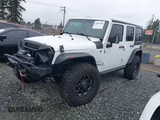 2014 Jeep Wrangler Unlimited Sahara with VIN 1C4BJWEG1EL127232, listed as a IAAI auction lot 41847368 with 109,975 mi miles. Bid and sale history available at carsss.com. Image 17.
