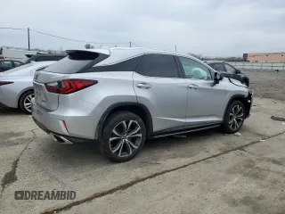 2019 Lexus RX with VIN 2T2BZMCAXKC197225, listed as a Copart auction lot 52859935 with 58,378 mi miles and Salvage Title. Bid and sale history available at carsss.com. Image 3.