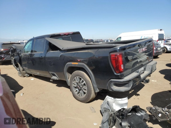 2023 GMC Sierra 3500HD AT4 z VIN 1GT49VEY1PF260918, wystawiony jako Copart lot #72765654 z przebiegiem 13 596 mil mil oraz Szkoda całkowita • Salvage title. Historia ofert i sprzedaży dostępna na DreamBid. Obrazek 2.