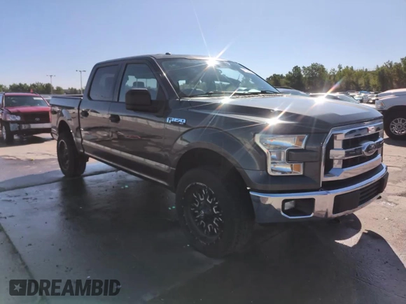 2015 Ford F-150 XLT with VIN 1FTEW1EF2FFC55441, listed as a Copart auction lot 61578305 with 109,975 mi miles and Salvage title. Bid and sale history available at DreamBid. Image 14.