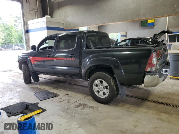 2010 Toyota Tacoma PreRunner with VIN 3TMJU4GN3AM097601, listed as a Copart auction lot 57703415 with 227,978 mi miles and Salvage title. Bid and sale history available at DreamBid. Image 2.