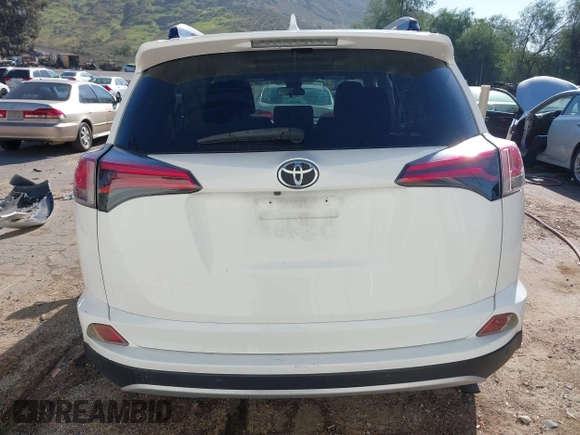2017 Toyota RAV4 XLE with VIN JTMWFREV9HJ128521, listed as a IAAI auction lot 41658054 with 106,788 mi miles and . Bid and sale history available at DreamBid. Image 16.