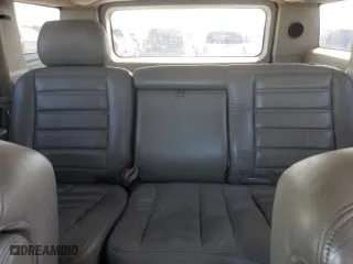 2003 Hummer H2 with VIN 5GRGN23U33H114427, listed as a Copart auction lot 76528834 with 133,571 mi miles and Salvage Title. Bid and sale history available at carsss.com. Image 10.