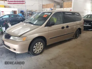 2001 Honda Odyssey LX with VIN 2HKRL18501H520823, listed as a Copart auction lot 56103985 with 157,509 mi miles and Clean title. Bid and sale history available at DreamBid. Image 1.