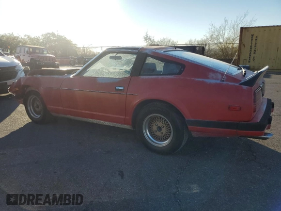 1983 Datsun 280ZX z VIN JN1HZ04S0DX569855, wystawiony jako Copart lot #74027594 z przebiegiem 12 300 mil mil oraz Szkody całkowita. Historia ofert i sprzedaży dostępna na DreamBid. Obrazek 2.