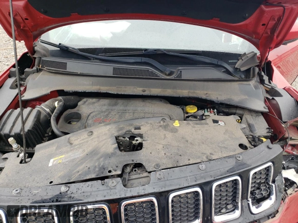 2019 Jeep Compass Latitude with VIN 3C4NJDBB7KT735802, listed as a Copart auction lot 57726275 with 58,660 mi miles and Salvage title. Bid and sale history available at DreamBid. Image 12.