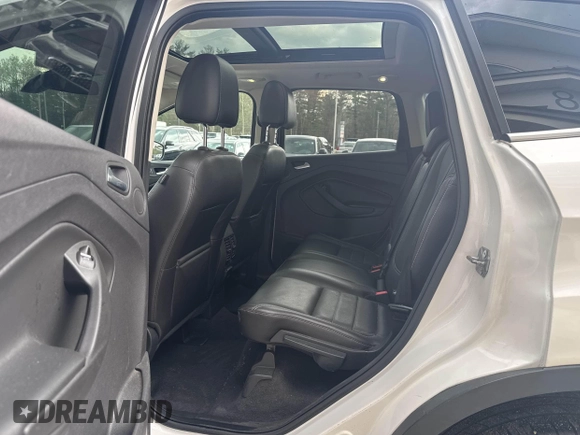 2014 Ford Escape Titanium with VIN 1FMCU9J94EUC63638, listed as a IAAI auction lot 42196241 with 198,112 mi miles and . Bid and sale history available at DreamBid. Image 8.