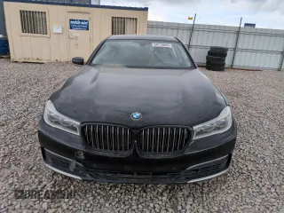 2017 BMW 7 Series 750i с VIN WBA7F0C35HGM21697, выставлен на аукционе Copart как лот 54713825 с пробегом Не указан миль и Списание • Salvage title. История ставок и продаж доступна на DreamBid. Изображение 5.