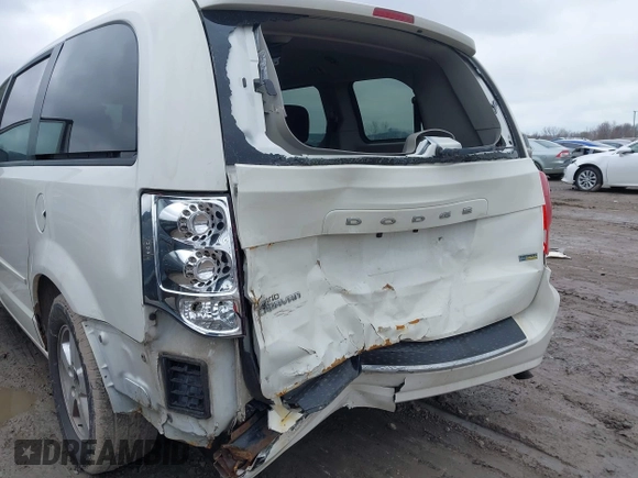 2012 Dodge Grand Caravan SXT with VIN 2C4RDGCG8CR294836, listed as a IAAI auction lot 41995385 with 184,475 mi miles and . Bid and sale history available at DreamBid. Image 6.