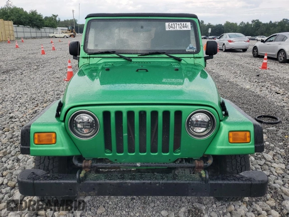 2004 Jeep Wrangler SE with VIN 1J4FA29124P769475, listed as a Copart auction lot 64371244 with 136,877 mi miles and Salvage title. Bid and sale history available at DreamBid. Image 5.
