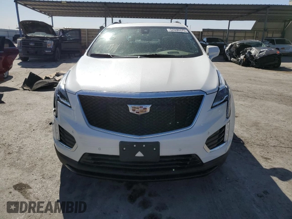 2021 Cadillac XT5 AWD Sport with VIN 1GYKNHRS2MZ156923, listed as a Copart auction lot 52696375 with 19,619 mi miles and Salvage title. Bid and sale history available at DreamBid. Image 5.