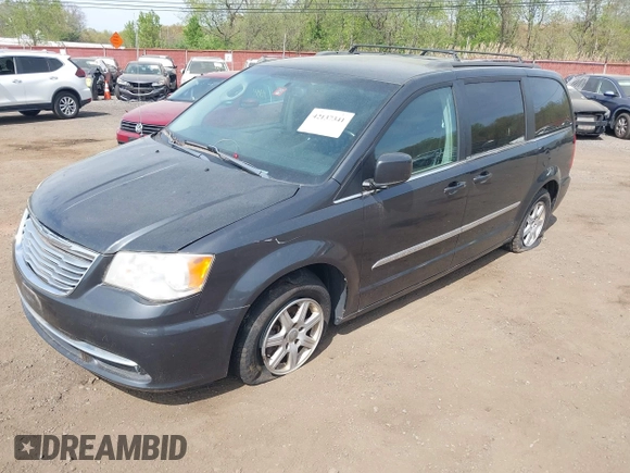 2012 Chrysler Town & Country Touring with VIN 2C4RC1BG8CR326041, listed as a IAAI auction lot 42137341 with 112,026 mi miles. Bid and sale history available at carsss.com. Image 2.