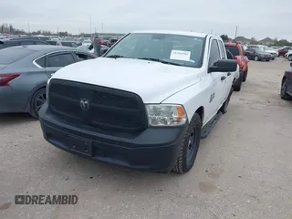 2020 Ram 1500 Classic Tradesman with VIN 1C6RR6FG7LS138428, listed as a IAAI auction lot 41585586 with 148,203 mi miles. Bid and sale history available at carsss.com. Image 2.