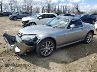 2010 Mazda MX-5 Miata Grand Touring with VIN JM1NC2FF5A0205822, listed as a Copart auction lot 45564895 with 48,844 mi miles and Salvage title. Bid and sale history available at DreamBid. Image 1.