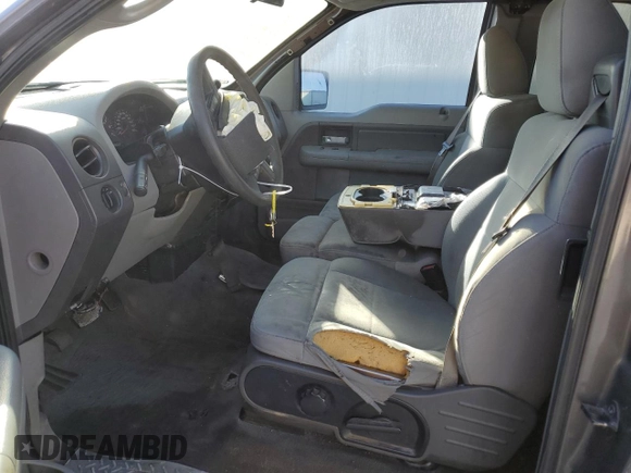 2007 Ford F-150 STX with VIN 1FTRX12W97KD12990, listed as a Copart auction lot 46939335 with 216,759 mi miles and Salvage Title. Bid and sale history available at DreamBid. Image 7.