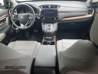 2020 Honda CR-V Touring z VIN 7FART6H94LE013557, wystawiony jako Copart lot #54605755 z przebiegiem 42 554 mil mil oraz Szkoda całkowita • Salvage title. Historia ofert i sprzedaży dostępna na DreamBid. Obrazek 8.
