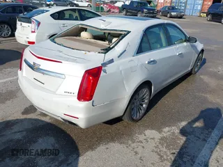 2015 Cadillac CTS Luxury AWD z VIN 1G6AX5SX9F0107244, wystawiony jako IAAI lot #42386444 z przebiegiem 171 413 mil mil oraz . Historia ofert i sprzedaży dostępna na DreamBid. Obrazek 4.
