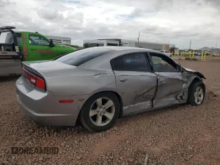 2013 Dodge Charger SE z VIN 2C3CDXBG2DH654105, wystawiony jako Copart lot #56041455 z przebiegiem 198 926 mil mil oraz Szkody całkowita. Historia ofert i sprzedaży dostępna na DreamBid. Obrazek 3.