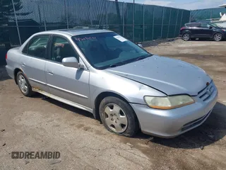 2001 Honda Accord EX z VIN 1HGCG16591A050572, wystawiony jako IAAI lot #42090584 z przebiegiem Nie podano mil oraz . Historia ofert i sprzedaży dostępna na DreamBid. Obrazek 1.