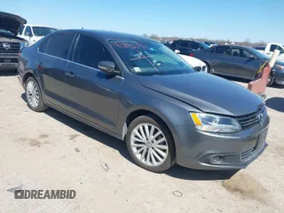 2012 Volkswagen Jetta SEL z VIN 3VWLP7AJXCM411848, wystawiony jako IAAI lot #41842094 z przebiegiem 191 145 mil mil oraz . Historia ofert i sprzedaży dostępna na DreamBid. Obrazek 1.
