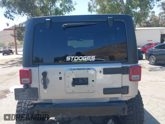 2018 Jeep Wrangler Unlimited Sport with VIN 1C4BJWDG4JL807265, listed as a IAAI auction lot 42520648 with 69,229 mi miles and . Bid and sale history available at DreamBid. Image 17.