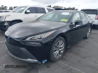 2021 Toyota Mirai XLE with VIN JTDAAAAA1MA002323, listed as a IAAI auction lot 42034157 with 16,592 mi miles and . Bid and sale history available at carsss.com. Image 2.