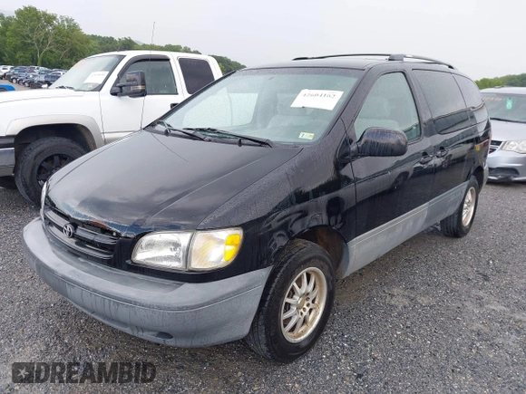 1998 Toyota Sienna LE with VIN 4T3ZF13C6WU016001, listed as a IAAI auction lot 42604162 with 214,491 mi miles and . Bid and sale history available at DreamBid. Image 6.