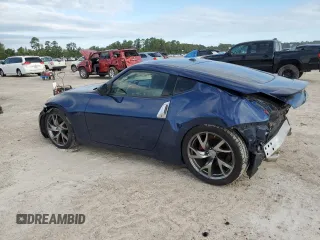 2013 Nissan 370Z with VIN JN1AZ4EH6DM880252, listed as a Copart auction lot 70528464 with 63,111 mi miles and Salvage Title. Bid and sale history available at carsss.com. Image 2.