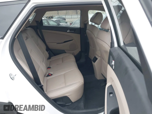 2016 Hyundai Tucson Limited with VIN KM8J33A2XGU037231, listed as a IAAI auction lot 42096501 with 151,912 mi miles and . Bid and sale history available at DreamBid. Image 8.
