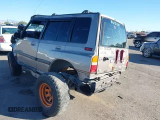 1995 Suzuki Sidekick JX z VIN 2S3TD03V3S6406536, wystawiony jako IAAI lot #40878592 z przebiegiem 253 055 mil mil oraz . Historia ofert i sprzedaży dostępna na DreamBid. Obrazek 3.