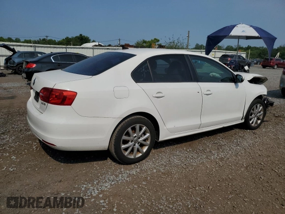 2012 Volkswagen Jetta SE with VIN 3VWDP7AJ3CM373089, listed as a Copart auction lot 59805205 with 123,345 mi miles and Salvage title. Bid and sale history available at DreamBid. Image 3.