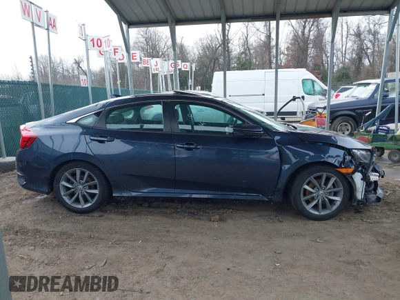 2020 Honda Civic EX-L with VIN 19XFC1F72LE214611, listed as a IAAI auction lot 41629949 with 54,328 mi miles and . Bid and sale history available at DreamBid. Image 13.