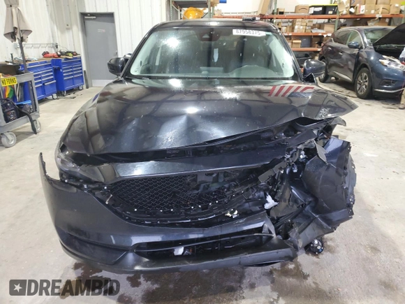 2018 Mazda CX-5 Grand Touring with VIN JM3KFADM3J0325843, listed as a Copart auction lot 87958375 with 93,577 mi miles and Salvage title. Bid and sale history available at DreamBid. Image 5.