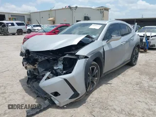 2019 Lexus UX 250h with VIN JTHU9JBH1K2010977, listed as a IAAI auction lot 42403115 with 85,906 mi miles and . Bid and sale history available at DreamBid. Image 2.