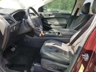 2020 Ford Edge Titanium z VIN 2FMPK4K92LBB03060, wystawiony jako Copart lot #56660685 z przebiegiem 66 342 mil mil oraz Szkoda całkowita • Salvage title. Historia ofert i sprzedaży dostępna na DreamBid. Obrazek 7.