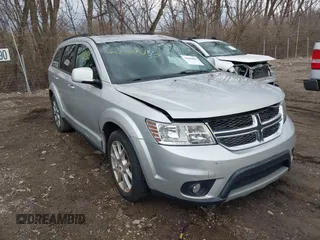 2014 Dodge Journey SXT z VIN 3C4PDCBB4ET266621, wystawiony jako IAAI lot #41664080 z przebiegiem 161 240 mil mil oraz . Historia ofert i sprzedaży dostępna na DreamBid. Obrazek 1.