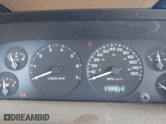 1999 Jeep Grand Cherokee Limited with VIN 1J4GW68NXXC727844, listed as a IAAI auction lot 41290773 with 222,838 mi miles. Bid and sale history available at carsss.com. Image 7.