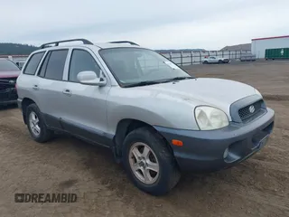 2003 Hyundai Santa Fe GLS z VIN KM8SC73DX3U357525, wystawiony jako IAAI lot #42436777 z przebiegiem 228 844 mil mil oraz . Historia ofert i sprzedaży dostępna na DreamBid. Obrazek 1.
