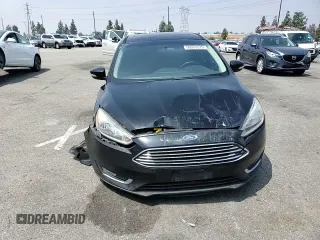 2018 Ford Focus Titanium с VIN 1FADP3N28JL250097, выставлен на аукционе Copart как лот 59972575 с пробегом 127 773 миль миль и Списание • Salvage title. История ставок и продаж доступна на DreamBid. Изображение 13.