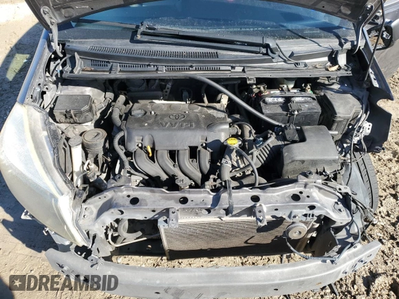 2012 Toyota Yaris L z VIN JTDKTUD35CD505783, wystawiony jako Copart lot #42017425 z przebiegiem 182 875 mil mil oraz Szkoda całkowita • Salvage title. Historia ofert i sprzedaży dostępna na DreamBid. Obrazek 11.