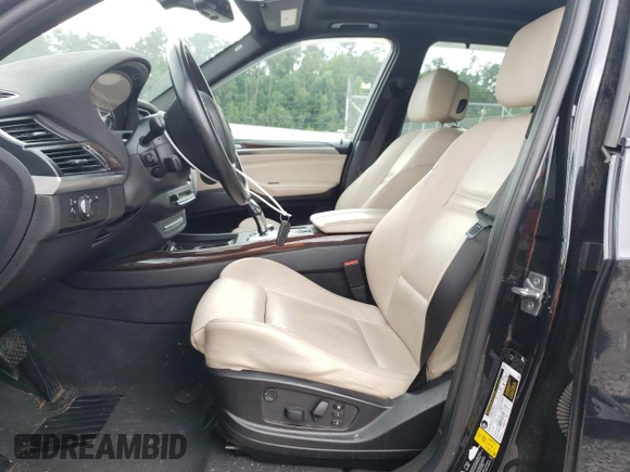 2011 BMW X5 50i with VIN 5UXZV8C52BL419028, listed as a Copart auction lot 59870505 with 126,666 mi miles and Salvage title. Bid and sale history available at DreamBid. Image 7.