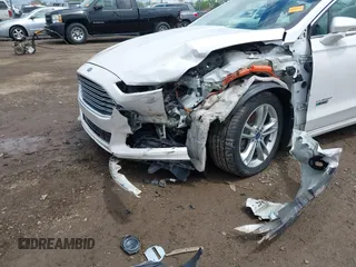 2016 Ford Fusion Titanium with VIN 3FA6P0SU5GR287017, listed as a IAAI auction lot 42316622 with 97,000 mi miles and . Bid and sale history available at DreamBid. Image 6.