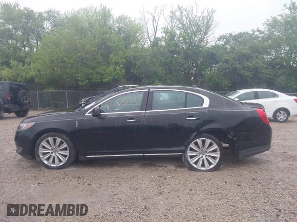 2013 Lincoln MKS EcoBoost with VIN 1LNHL9FT4DG607785, listed as a IAAI auction lot 42279833 with 126,548 mi miles and . Bid and sale history available at DreamBid. Image 14.