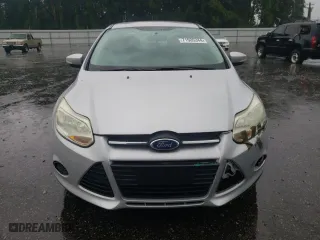 2014 Ford Focus SE with VIN 1FADP3F22EL103956, listed as a Copart auction lot 71005344 with 102,509 mi miles and Salvage Title. Bid and sale history available at carsss.com. Image 5.