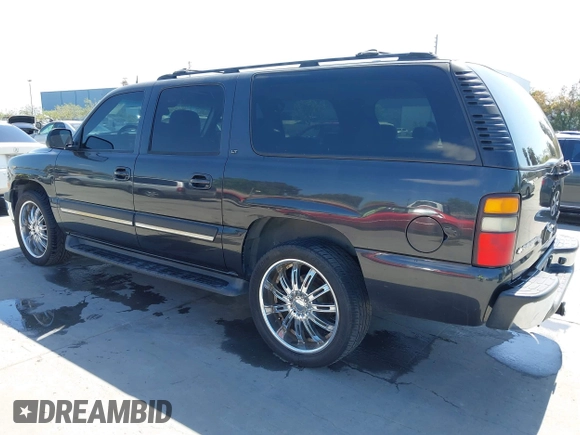 2005 Chevrolet Suburban Z71 with VIN 3GNFK16Z35G126718, listed as a IAAI auction lot 42084280 with 237,875 mi miles. Bid and sale history available at carsss.com. Image 3.