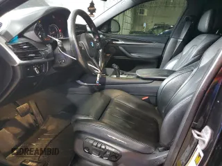 2016 BMW X6 xDrive50i with VIN 5UXKU6C51G0R34443, listed as a Copart auction lot 66511594 with 129,083 mi miles and Salvage Title. Bid and sale history available at carsss.com. Image 7.