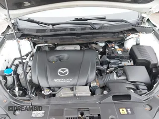 2016 Mazda CX-5 Grand Touring z VIN JM3KE4DY0G0705884, wystawiony jako IAAI lot #42016910 z przebiegiem 73 324 mil mil oraz . Historia ofert i sprzedaży dostępna na DreamBid. Obrazek 10.