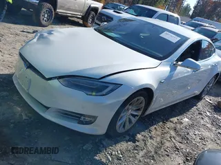 2016 Tesla Model S 70 with VIN 5YJSA1E16GF164264, listed as a IAAI auction lot 40976293 with 68,940 mi miles and . Bid and sale history available at DreamBid. Image 19.
